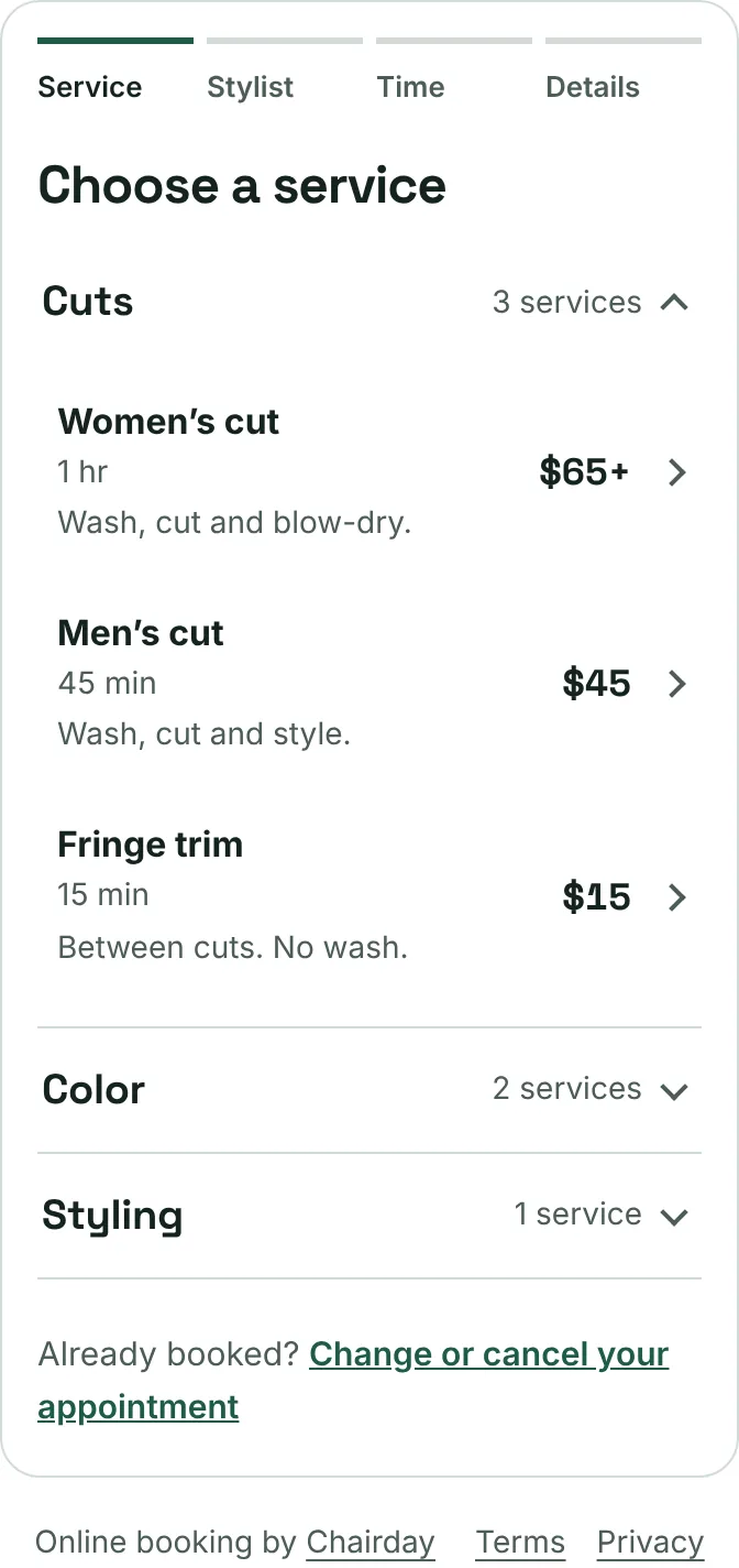 Booking page on a phone, choosing a service. Cuts: Women’s cut, 1 hr, from $65. Men’s cut, 45 min, $45. Fringe trim, 15 min, $15. Color and Styling groups below.